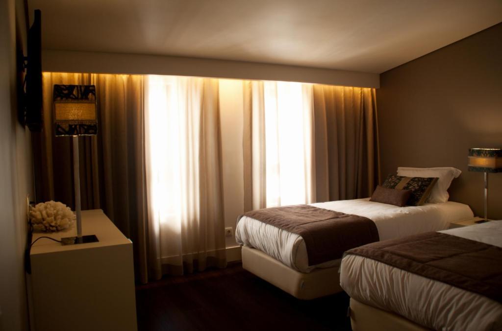 Aqua Ria Boutique Hotel FAO Oda fotoğraf