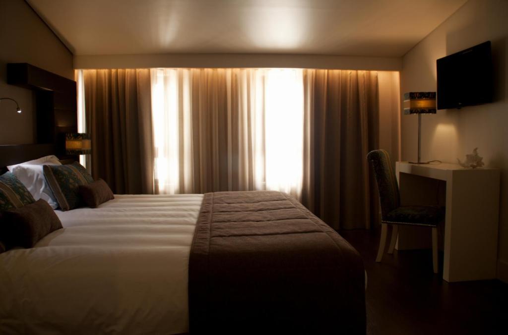 Aqua Ria Boutique Hotel FAO Oda fotoğraf